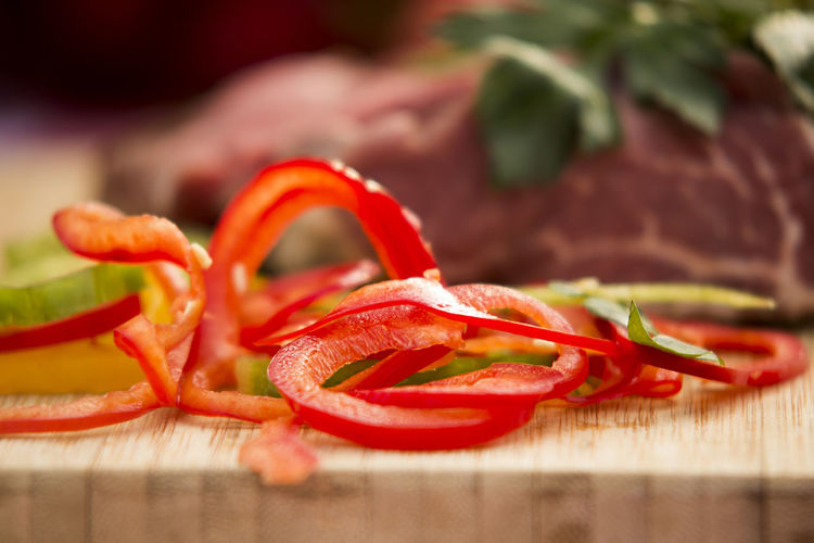 Close-up of red bell pepper on cutting board