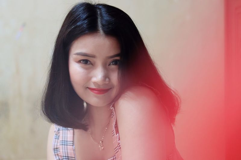 Portrait of smiling young woman