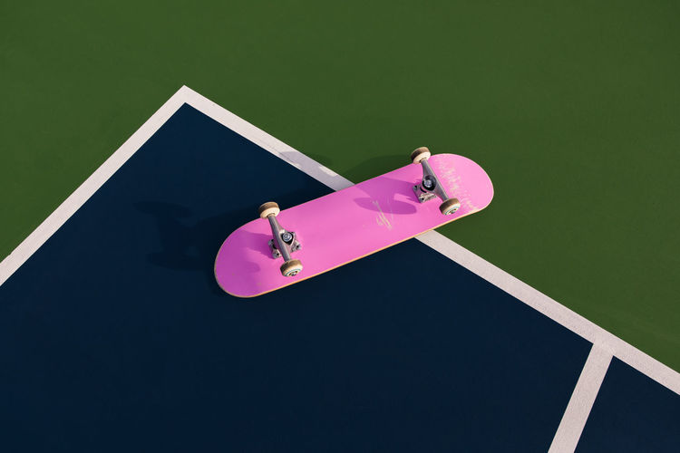 High angle view of toy against pink background