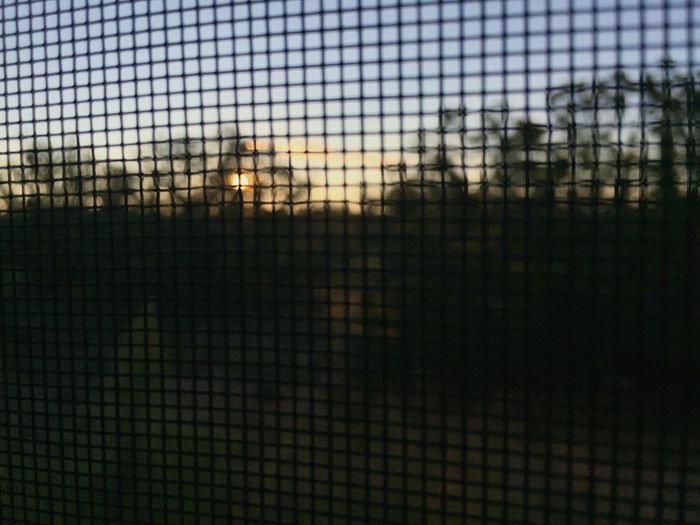 Full frame shot of fence against the sky