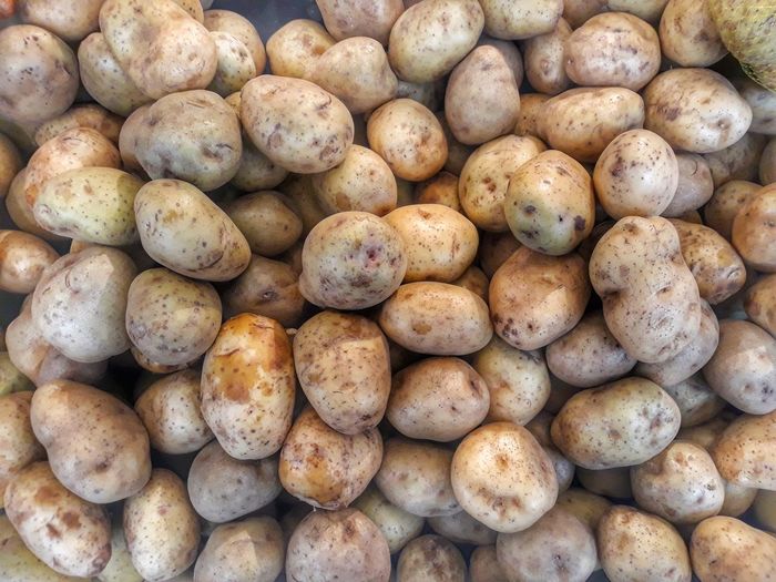 Full frame shot of potatoes for sale at market stall