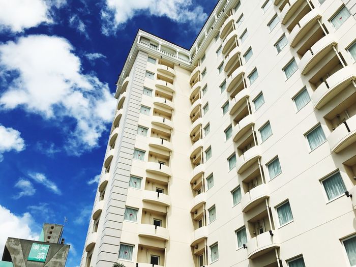Low angle view of residential building against sky