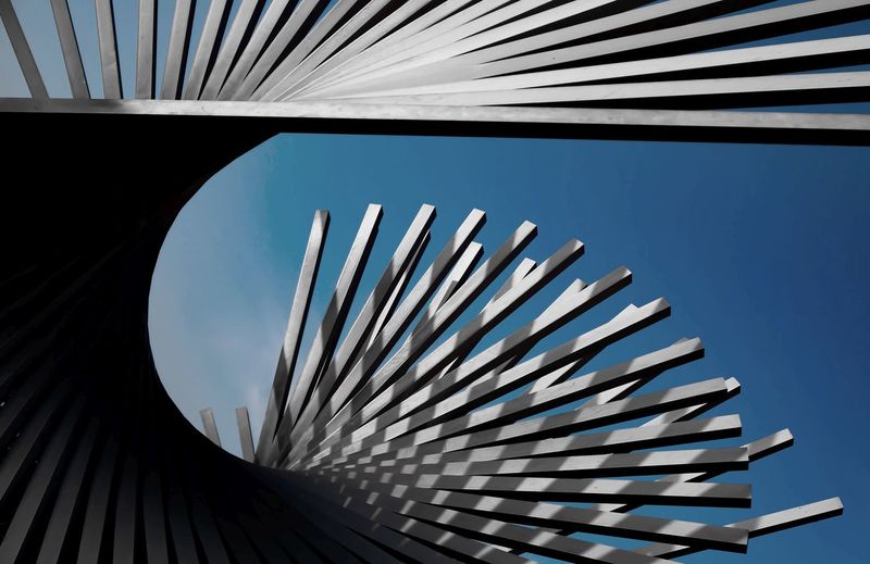 LOW ANGLE VIEW OF METAL AGAINST BLUE SKY