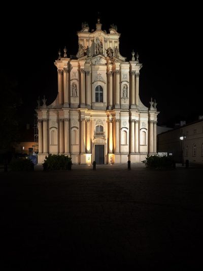 Facade of historic building at night