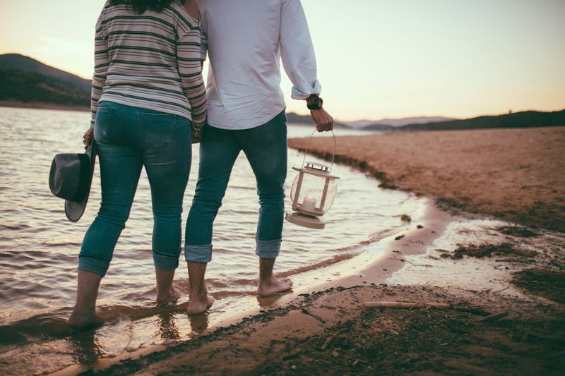 Couple walking on beach