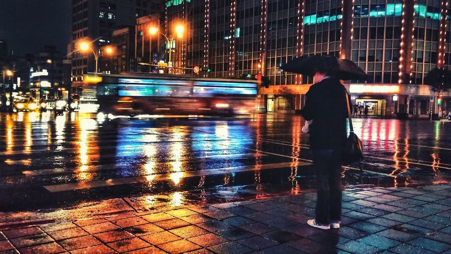 Man on street at night