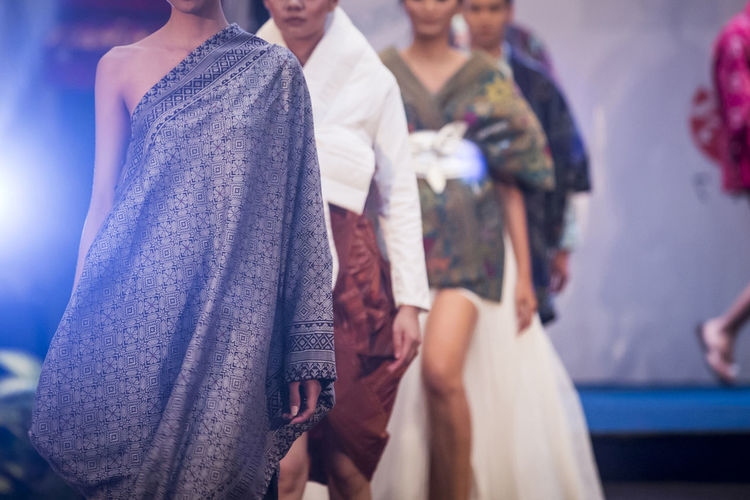 Fashion models walking on ramp