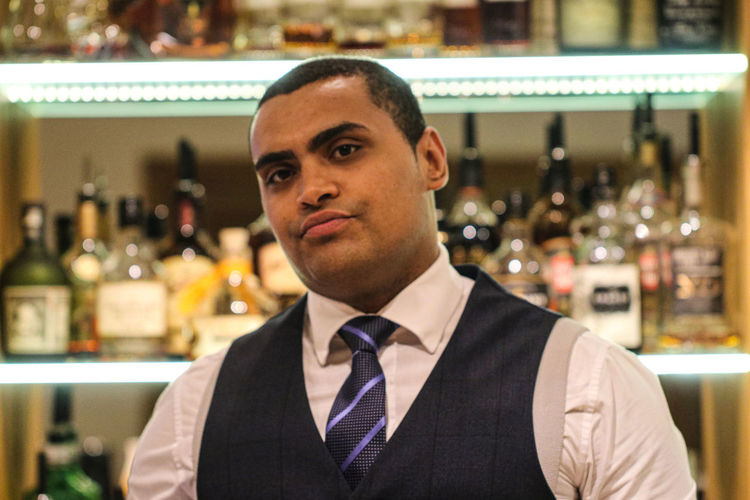Close-up portrait of man in bar
