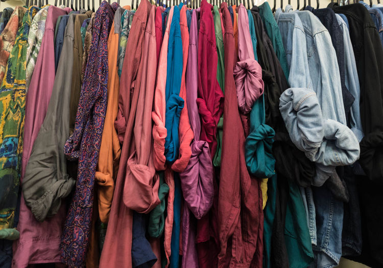 Clothes hanging on display for sale