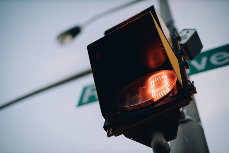 Looking up at traffic light timer.