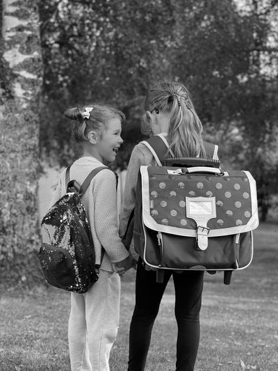 Little girls with backpacks 