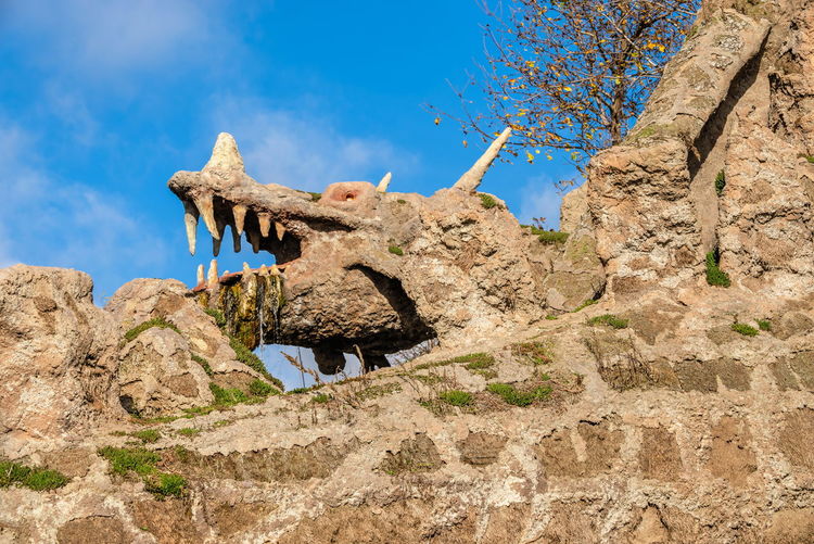 Uman, ukraine. sculpture dragons in the fantasy park nova sofiyivka, uman, ukraine, on a sunny day