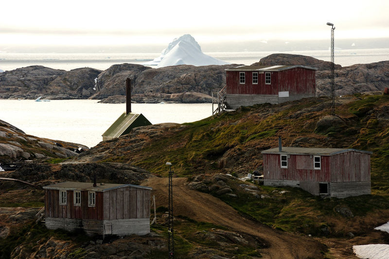 Dilapidated houses in kulusuk, on greenland's east coast