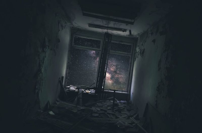 Stars seen through window in abandoned room