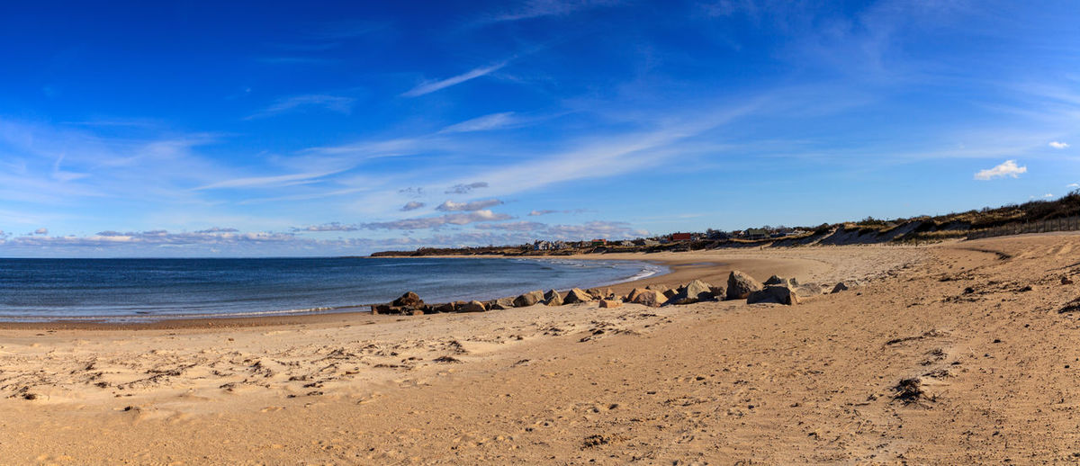 Scenic view of beach against sky