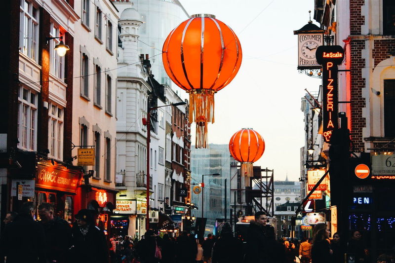 Crowded street with hanging chinese lanterns