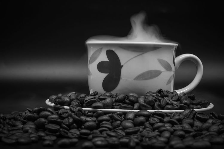 Close-up of coffee cup on table