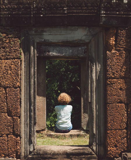 Woman sitting at window