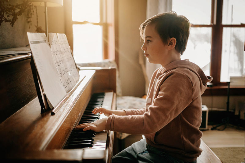 Boy playing piano