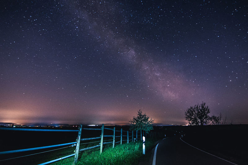 Scenic view of star field against sky at night