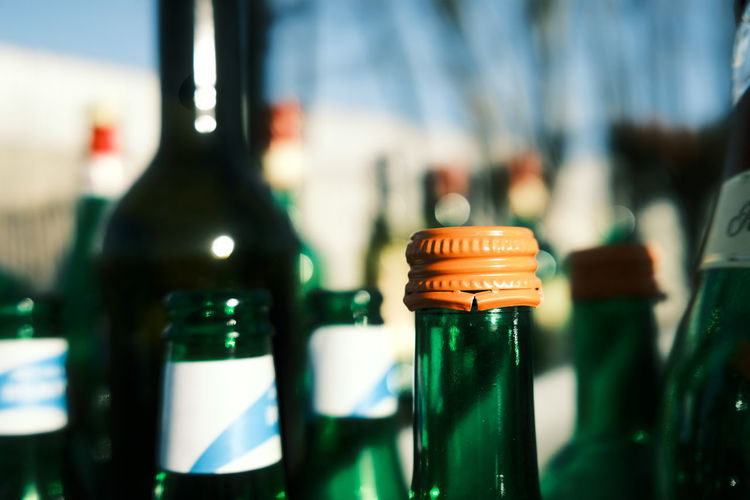Close-up of beer glass bottles