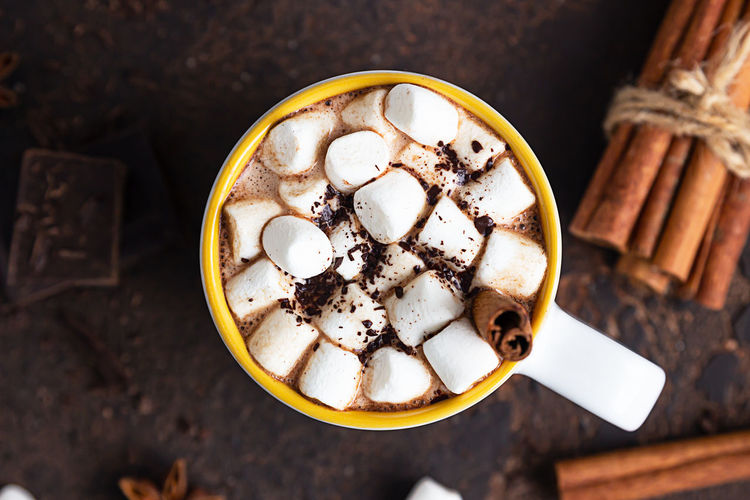 Hot cocoa or chocolate with marshmallow and anise, cinnamon and chocolate.