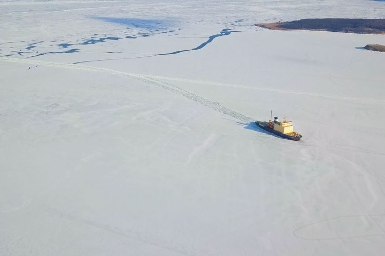 High angle view of nautical vessel on sea during winter
