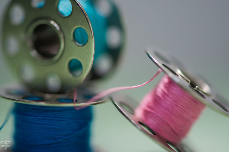 Close-up of thread spools 
