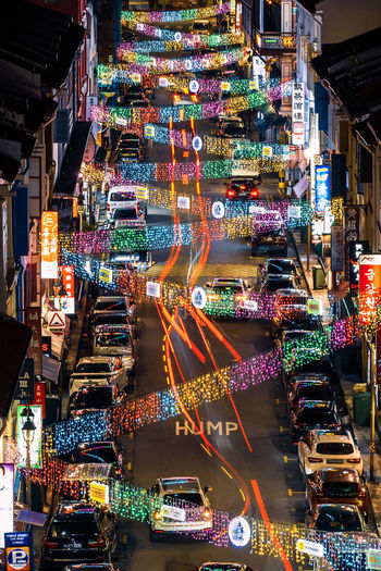 Aerial view of illuminated street market