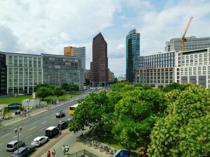 Panoramic view of city buildings against sky