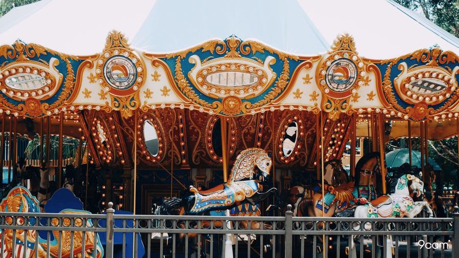Low angle view of carousel in amusement park