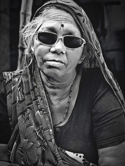 Portrait of senior woman wearing sunglasses