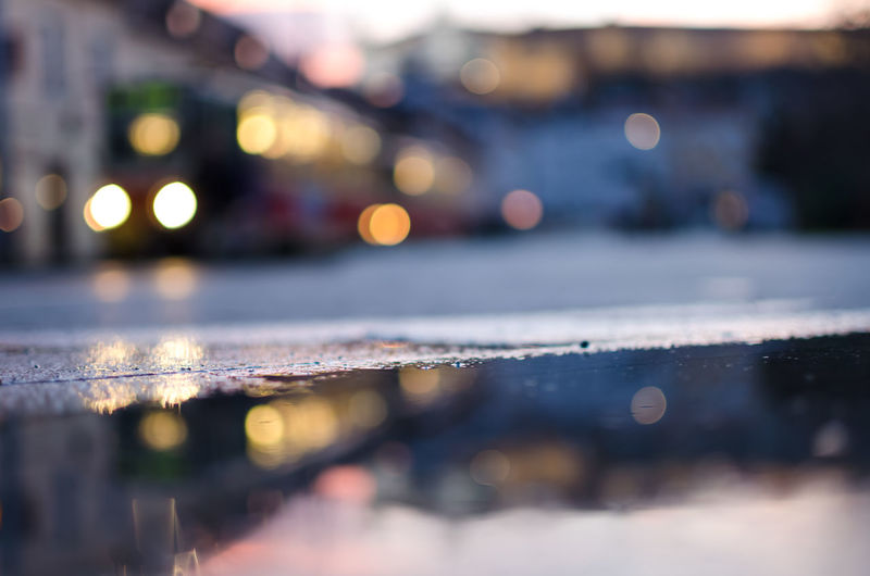 Defocused image of illuminated city at night