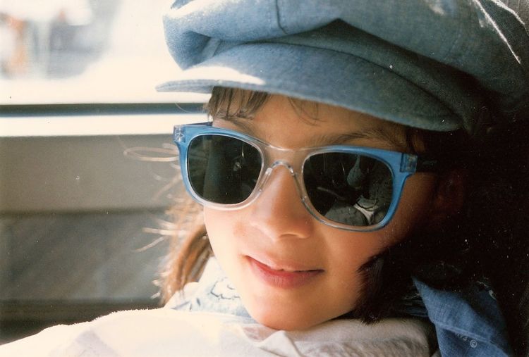 Close-up portrait of girl wearing sunglasses