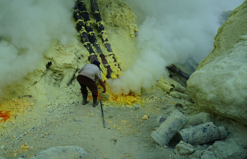 The miner at ijen crater indonesia
