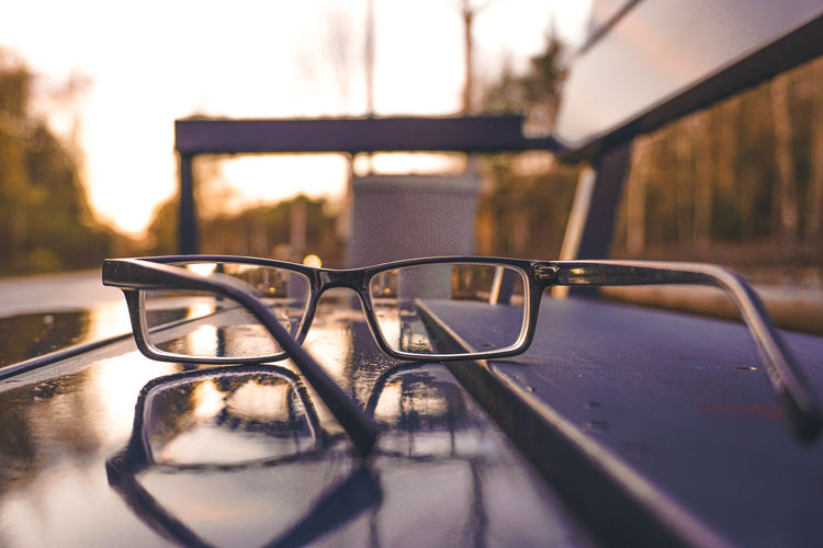 Close-up of eyeglasses against blurred background