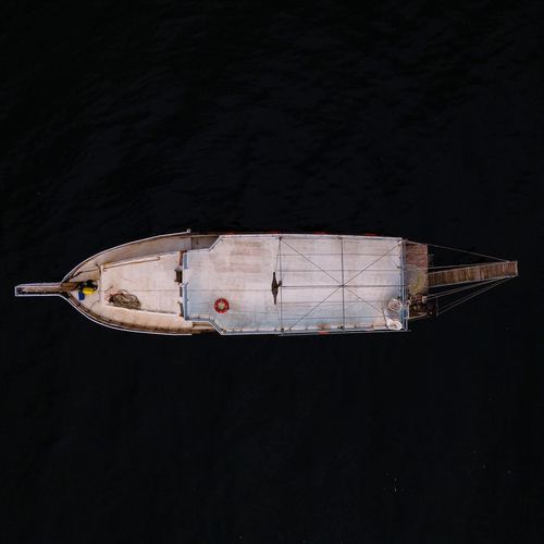 Low angle view of boat against black background