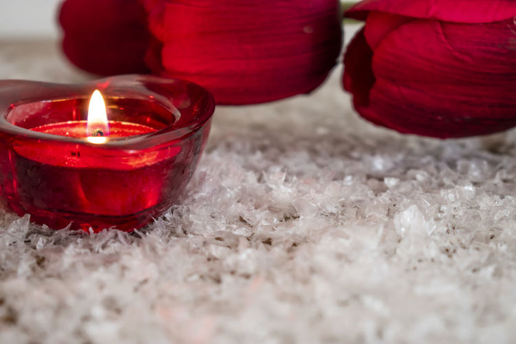 Close-up of red candles on table
