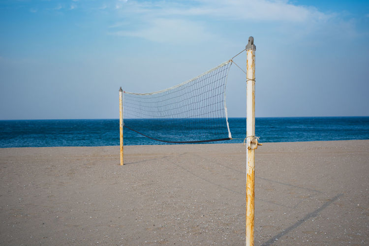 Volley ball net stands on a off-season sand beach of east sea, south korea