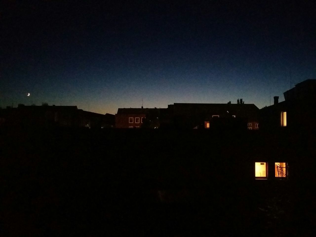 ILLUMINATED BUILDINGS AT NIGHT