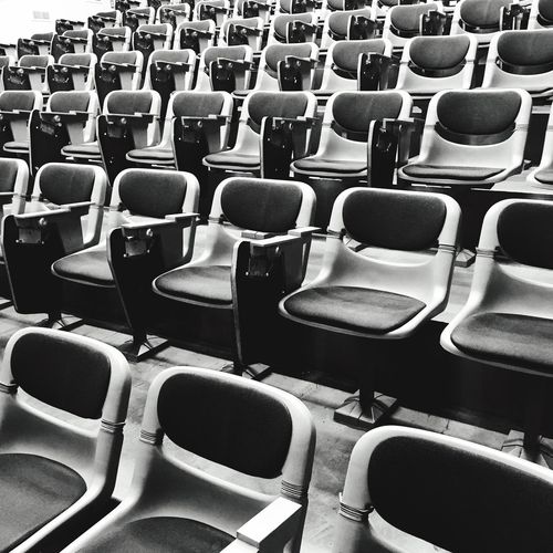 Empty chairs in rows