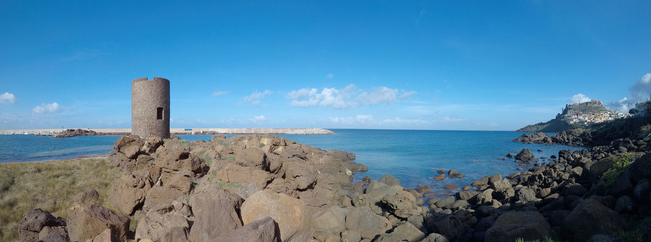 Scenic view of sea against blue sky