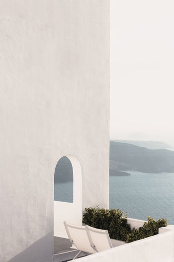 White house in santorini with view on the caldera, cyclades, greece