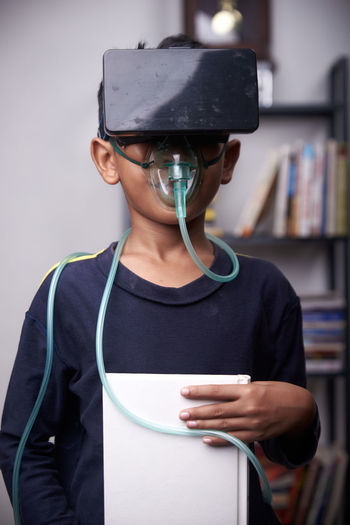 Close-up of man with nebulizer