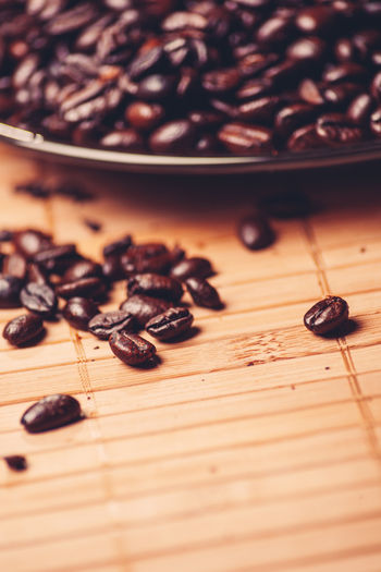 High angle view of roasted coffee beans on table