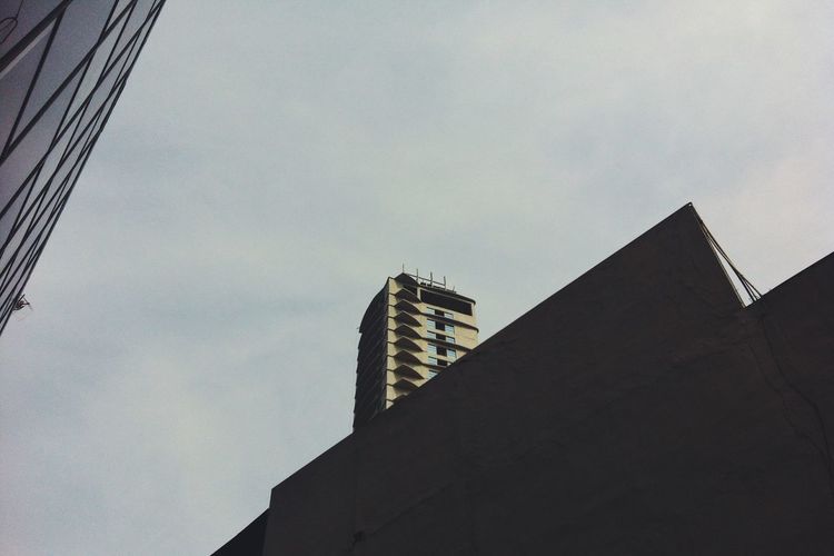 Low angle view of modern building against sky
