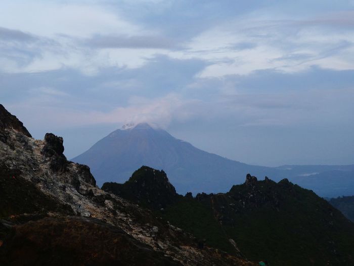 Scenic view of volcanic mountain against sky