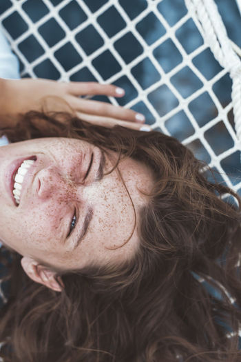Hortense, sailing in the Caribbean Sea. Series on freckles, these small stain that are revealing on the first rays of sun. Complex for some and for others a sign of difference. At once so intimate and yet visible to all. ┃ Hortense, naviguant dans la mer des Caraïbes. Série sur les tâches de rousseur, ces petites tâches qui se rêvelent aux premiers rayons de soleil. Complexe pour certain et pour d'autres un signe de différence. A la fois si intime et pourtant visible par tous. Freckleface Nature Simple Moment The Portraitist - 2018 EyeEm Awards Tranquility Adventure Caribbean Females Freckles Girl Hair Human Face Lifestyles One Person Portrait Real People Sail Sailing Sea Simplicity Smile Smiling Women Young Adult Young Women The Great Outdoors - 2018 EyeEm Awards The Traveler - 2018 EyeEm Awards My Best Photo