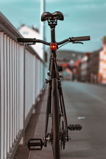 Close-up of bicycle on street