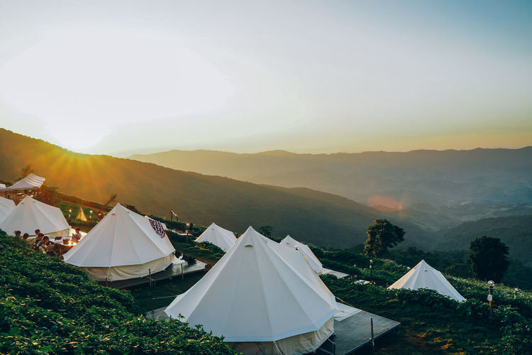 Scenic view of mountains against sky during sunrise